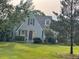 Well-maintained home with a manicured lawn, gray siding, and appealing curb appeal at 11609 Us 401, Fuquay Varina, NC 27526