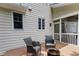 A cozy back deck area features two chairs and a fire pit, perfect for outdoor relaxation and entertaining at 118 Killingsworth Dr, Cary, NC 27518