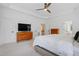 Bright main bedroom features hardwood furniture at 118 Killingsworth Dr, Cary, NC 27518