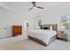 Bright main bedroom features a tray ceiling and hardwood furniture at 118 Killingsworth Dr, Cary, NC 27518