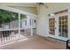 Cozy screened-in porch with wood flooring offering privacy, a view of the backyard, and indoor/outdoor living at 118 Killingsworth Dr, Cary, NC 27518