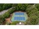 Aerial view of community tennis courts surrounded by lush trees at 118 Killingsworth Dr, Cary, NC 27518