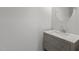 Bathroom featuring a single vanity with white marble countertop at 120 Firefly Ln, Louisburg, NC 27549
