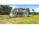 Exterior of home featuring a back porch with wood stairs at 120 Firefly Ln, Louisburg, NC 27549