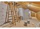 Insulated attic space ready for customization, showing wooden ladder and wooden frame at 121 Nate Ct, Wake Forest, NC 27587