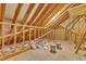 Unfinished attic space ready for customization, showing wooden beams and framework at 121 Nate Ct, Wake Forest, NC 27587