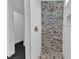 Shower features white tile walls, mosaic accent tile, bronze fixtures, and a built-in niche at 121 Nate Ct, Wake Forest, NC 27587