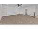Expansive carpeted bonus room offering versatile space and featuring multiple doorways at 121 Nate Ct, Wake Forest, NC 27587