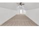 A large carpeted attic bonus room, offering a versatile space with good lighting at 121 Nate Ct, Wake Forest, NC 27587