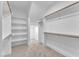 Spacious walk-in closet offering ample shelf and hanging storage space for your entire wardrobe at 121 Nate Ct, Wake Forest, NC 27587