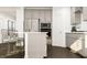 Bright kitchen featuring stainless steel appliances and an island with seating at 1303 Cosmic Dr, Durham, NC 27703