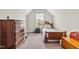 Cozy bedroom features a window, dresser and a twin bed at 137 Clydes Point Way, Wendell, NC 27591