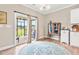 Cozy dining area with sliding glass doors leading to an outdoor deck at 137 Clydes Point Way, Wendell, NC 27591