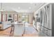 Open-concept kitchen and living room with stainless steel appliances and hardwood floors at 137 Clydes Point Way, Wendell, NC 27591