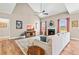 Bright living room with vaulted ceilings, a fireplace, and comfortable seating at 137 Clydes Point Way, Wendell, NC 27591
