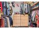 Well-organized walk-in closet includes hanging storage, shelving, and dresser at 137 Clydes Point Way, Wendell, NC 27591