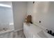 Bathroom featuring double sinks, quartz countertops, and a separate shower area at 145 Tee Dr, Selma, NC 27576