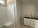 Bathroom showcasing a shower unit and vanity, ready for personal touches and customization at 145 Tee Dr, Selma, NC 27576