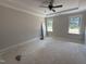 Bright bedroom with natural light, neutral walls, and comfortable space at 145 Tee Dr, Selma, NC 27576