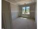 Bedroom under construction, featuring large windows and ample natural light at 145 Tee Dr, Selma, NC 27576