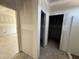 Hallway connecting the different rooms of the home, offering ease of movement at 145 Tee Dr, Selma, NC 27576