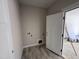 Practical laundry room space featuring connections for washer and dryer at 145 Tee Dr, Selma, NC 27576