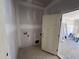 Laundry room with access to the rest of the house under construction, featuring drywall at 145 Tee Dr, Selma, NC 27576