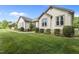 A charming, well-maintained home showcasing its manicured lawn and inviting curb appeal at 1614 E Hardscrabble Dr, Hillsborough, NC 27278