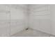 A spacious walk-in closet provides ample storage space with multiple levels of wire shelving at 1614 E Hardscrabble Dr, Hillsborough, NC 27278