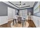 Stylish dining room with designer ceiling, wooden table, and elegant decor at 1716 Aberdour Dr, Apex, NC 27502