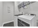 Laundry room with newer front loading washer and dryer at 1716 Aberdour Dr, Apex, NC 27502