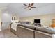 Spacious upstairs living room with a sectional couch and a TV at 1716 Aberdour Dr, Apex, NC 27502