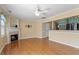 Bright living room showcasing hardwood floors, a fireplace, and an open layout at 1966 Grassy Banks Dr, Raleigh, NC 27610