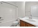 Bathroom includes a tub-shower combo and a vanity with traditional wood cabinet, designed for daily comfort at 2036 October Dr, Durham, NC 27703