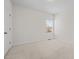 Bright and airy bedroom with plush carpeting, fresh paint, and a window to capture natural light at 2036 October Dr, Durham, NC 27703