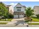 Charming two-story home with stone accents and a two-car garage at 2036 October Dr, Durham, NC 27703