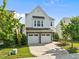 Charming two-story home with stone accents and a two-car garage at 2036 October Dr, Durham, NC 27703