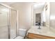 View of a bathroom with a tiled shower and vanity at 205 Person St, Oxford, NC 27565