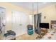 View of a bedroom with a bed, and dark curtains hanging on the windows at 205 Person St, Oxford, NC 27565