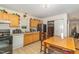 View of a dining area with a wooden table, chairs and an appliance filled counter at 205 Person St, Oxford, NC 27565