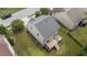 An aerial view shows the home's roof, deck, and landscaped yard at 205 Willow Weald Ct, Fuquay Varina, NC 27526