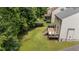 The home features a backyard with a deck perfect for grilling at 205 Willow Weald Ct, Fuquay Varina, NC 27526