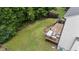 An aerial view of the home's wooden deck and green backyard at 205 Willow Weald Ct, Fuquay Varina, NC 27526