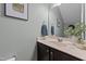 Bathroom with single sink vanity and a mirror at 205 Willow Weald Ct, Fuquay Varina, NC 27526