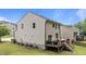 The back of the home has a deck perfect for entertaining at 205 Willow Weald Ct, Fuquay Varina, NC 27526