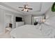 Large main bedroom with ensuite bathroom access, walk-in closet, and neutral decor at 205 Willow Weald Ct, Fuquay Varina, NC 27526