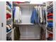 Walk-in closet with custom shelving, providing ample space for storage and organization at 215 Dungarven Loop, Cary, NC 27513
