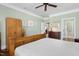 Spacious main bedroom featuring wood furniture and neutral walls, creating a tranquil retreat at 215 Dungarven Loop, Cary, NC 27513