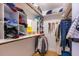 Organized walk-in closet with shelving, hanging racks, and ample storage space at 215 Dungarven Loop, Cary, NC 27513