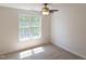 Bedroom with carpet and window providing natural light at 227 Shalimar Dr, Durham, NC 27713